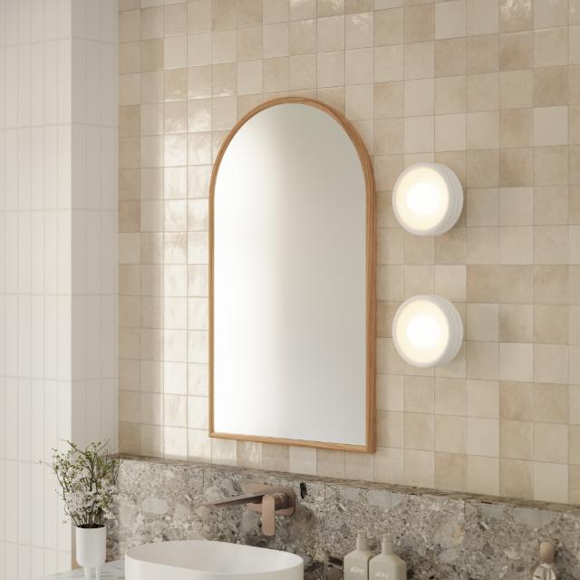 Ingrain timber framed arch mirror with natural ash finish, wall hung above vanity in a tiled bathroom scene