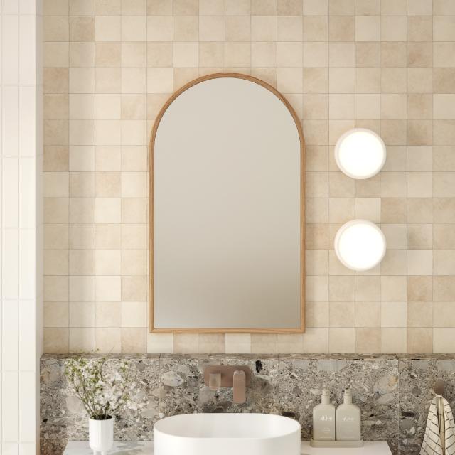 Ingrain timber framed arch mirror with natural woodgrain finish, mounted above a bathroom vanity in portrait view