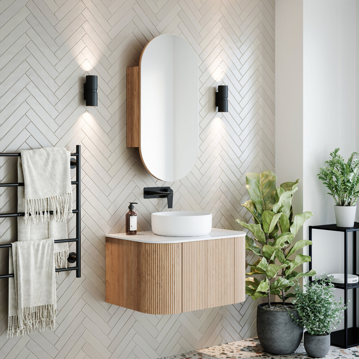 Ingrain curved fluted wall hung vanity in woodgrain with white top and basin, styled in a modern bathroom setting