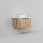 Ingrain curved fluted wall hung vanity in woodgrain finish with white top and round basin, front view
