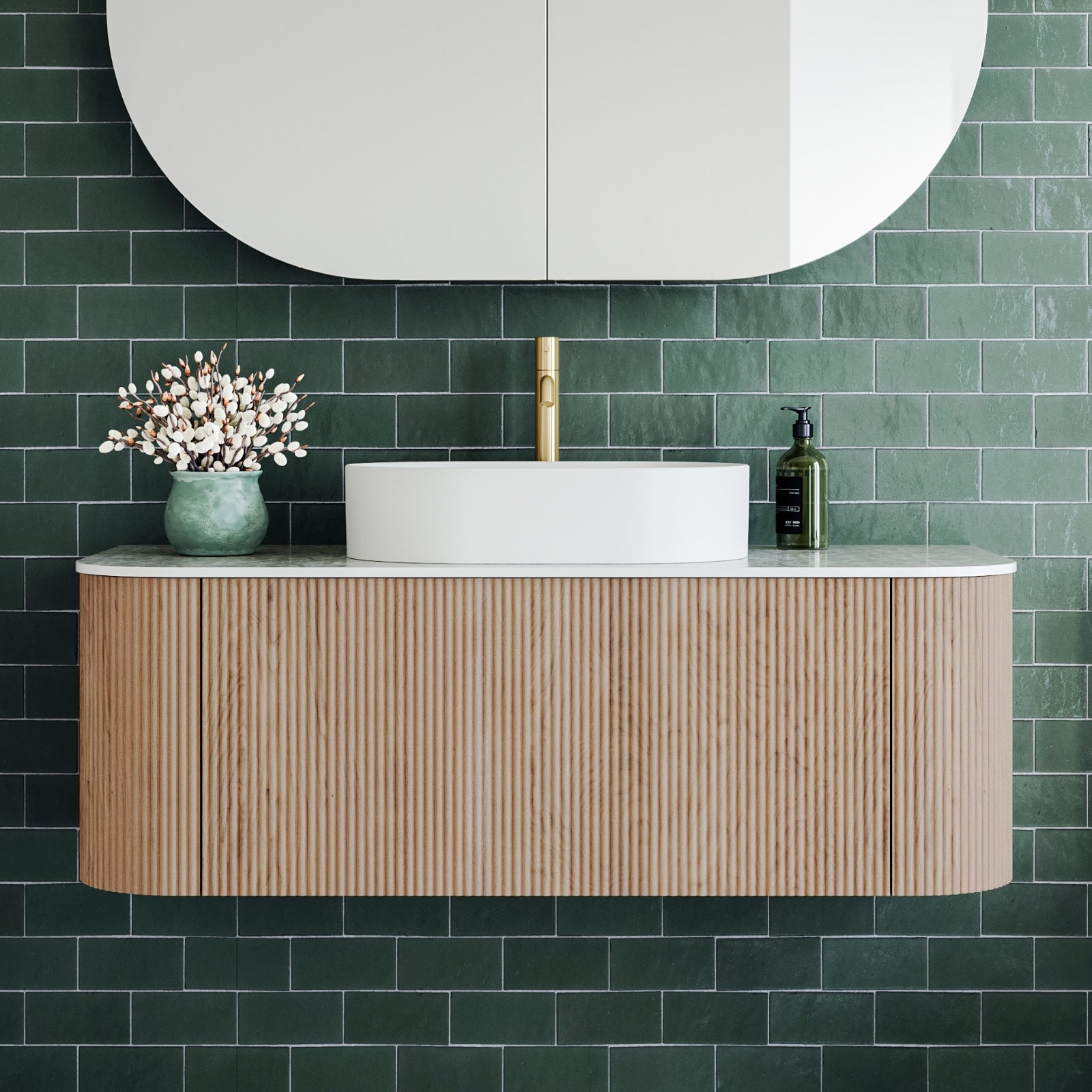 Ingrain curved fluted wall hung vanity in woodgrain with white top and basin, front view against green tiled wall