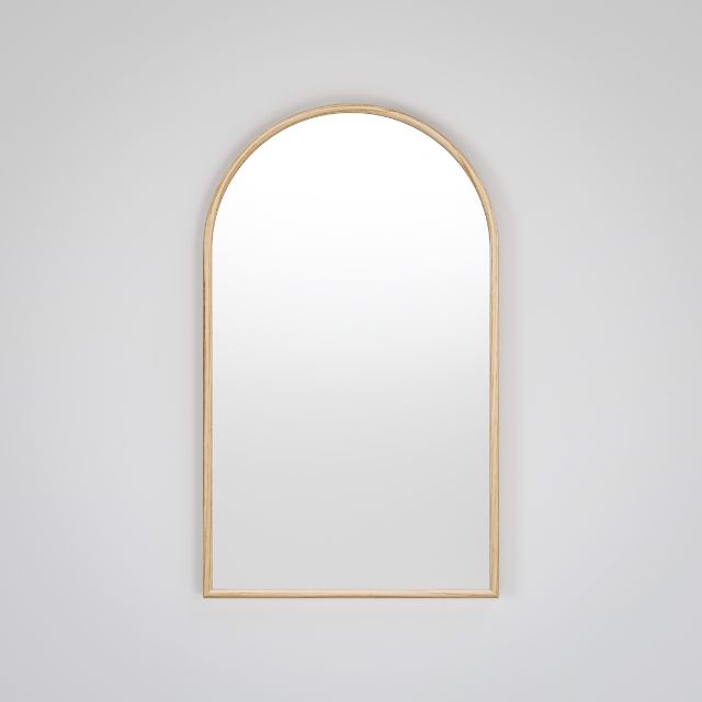 Ingrain timber framed arch mirror with natural ash woodgrain finish, shown front on against a light wall