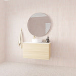 Marquis Marq wall hung vanity in coastal oak, with white top and round basin, shown in a bathroom setting