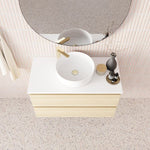 Marquis Marq wall hung vanity with white top, centre basin and timber-look drawers, shown in bathroom setting from above