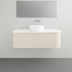 Marquis Shore wall hung vanity with fluted curved cabinet, white solid surface top and round basin, front view
