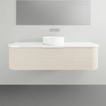 Marquis Shore wall-hung vanity with fluted curved cabinet, white solid surface top and round basin, front view
