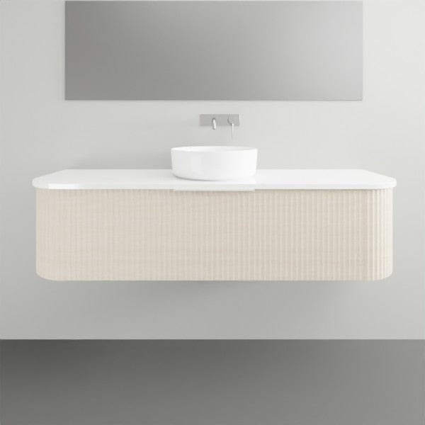 Marquis Shore wall-hung vanity with fluted curved cabinet, white solid surface top and round basin, front view