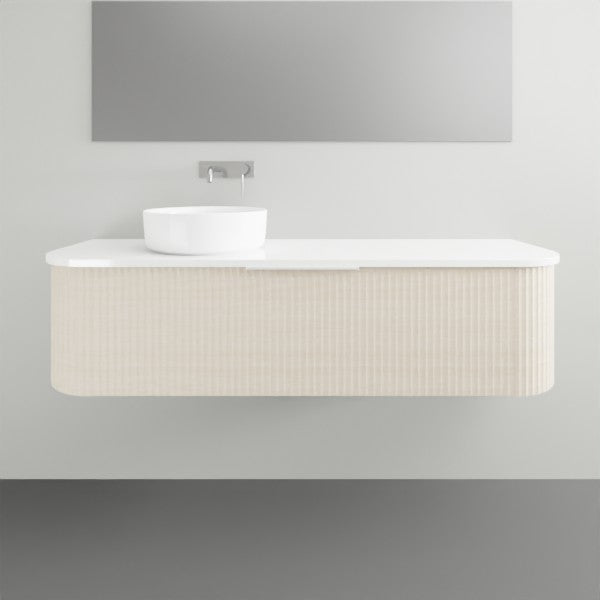 Marquis Shore wall hung vanity with white solid surface top, single basin and fluted curved woodgrain cabinet in Coastal Oak