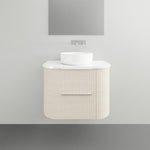 Marquis Shore wall-hung vanity with fluted curved woodgrain drawer, white solid surface top and round basin