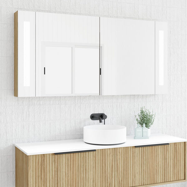 Marquis Urban Lights wall-hung shaving cabinet in white and prime oak, with mirrored doors and vertical LED side lights above vanity