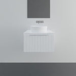 Marquis Valencia white wall hung vanity with shiplap front and above-counter basin in a minimalist bathroom setting