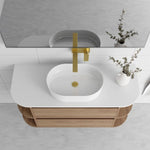 Marquis Avion wall hung vanity with white top, oval basin and timber-look drawers, front view in bathroom setting