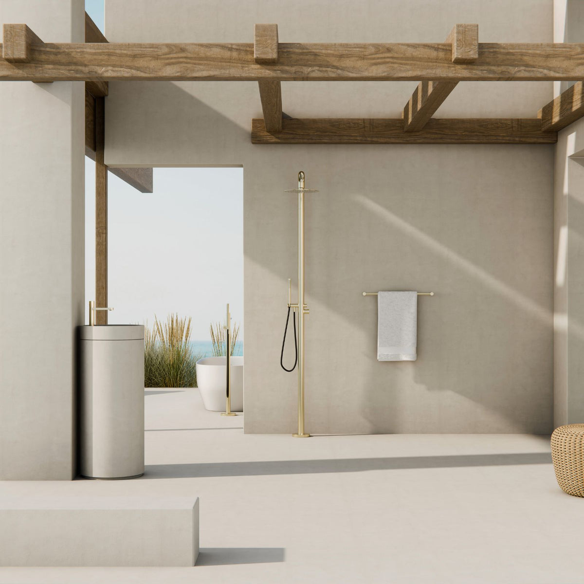 Brushed gold Nero shower mixer in a minimalist bathroom, with wall-mounted shower and towel rail in a modern setting