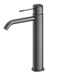 Nero Tapware Opal tall basin mixer in graphite, with textured cylindrical body and curved spout, side view on white background