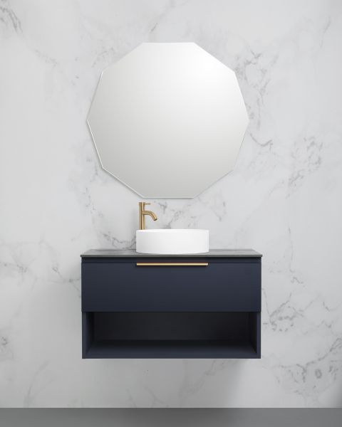 Marquis Oxford wall hung vanity in dark blue with open shelf, centred basin and brushed brass handle, front view
