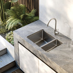Phoenix 2000 Series stainless steel 1-1/2 bowl kitchen sink installed in grey benchtop with mixer tap