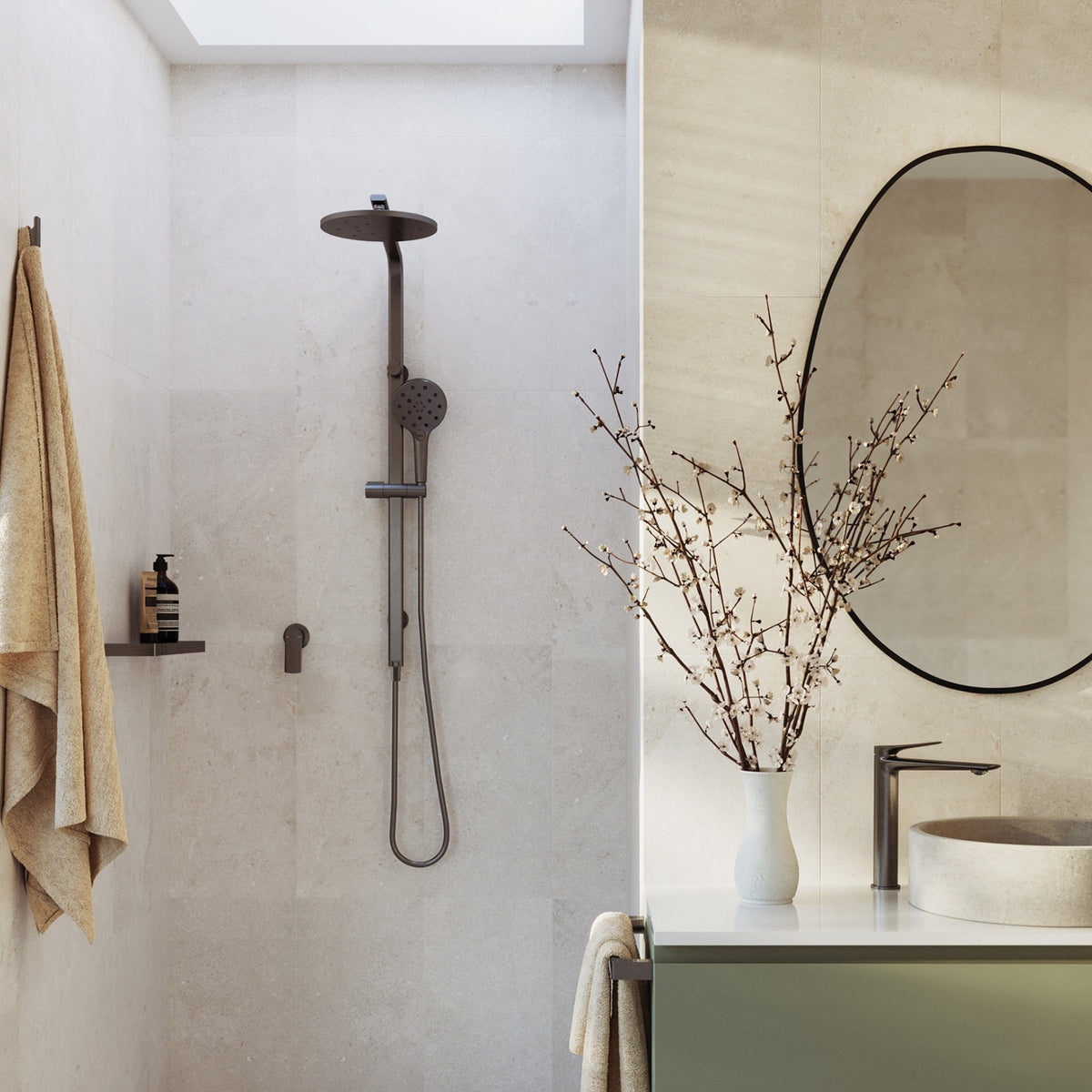 Phoenix Kusabi brushed carbon shower and basin mixer in a modern bathroom vanity and shower setting