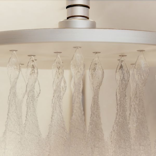 Phoenix Oxley twin rail shower in brushed gold, close-up of overhead rose with multiple spray nozzles and water flow