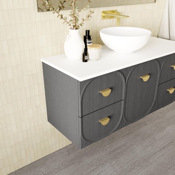 Marquis Port wall hung vanity with white solid surface top, dark timbergrain drawers and brass handles in bathroom setting