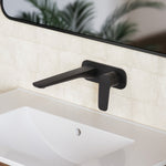 Caroma Contura II matte black wall basin mixer with 180mm spout and single lever, installed above a white basin