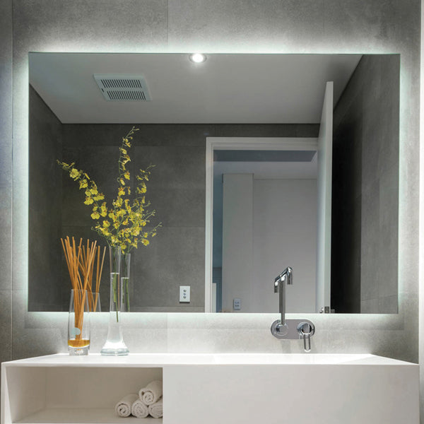 Thermogroup rectangular back-lit bathroom mirror with LED glow in a grey vanity setting