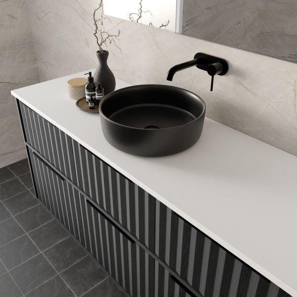 Marquis Salamander wall hung vanity with striped black drawers, white benchtop and black round basin, angled view