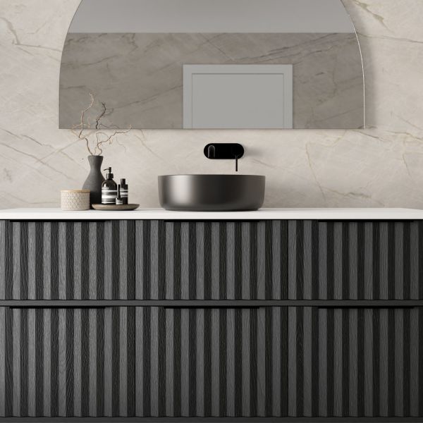 Marquis Salamander wall hung vanity in black, with ribbed drawers, white benchtop and round vessel basin in bathroom setting