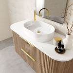 Marquis Shore 2 drawer wall hung vanity with white solid surface top, oval basin and fluted woodgrain finish