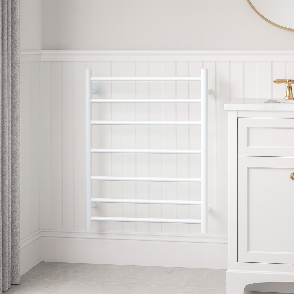 Thermogroup 7 bar white satin heated towel rail on a bathroom wall beside a vanity