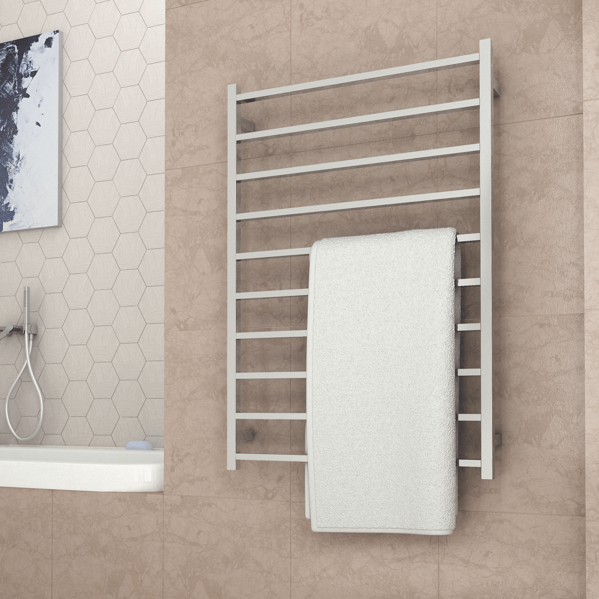 Thermogroup polished stainless steel 10-bar heated towel rail on a tiled bathroom wall, holding a white towel