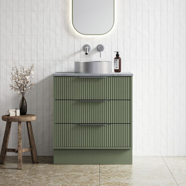 Timberline Emmett Dockland floor standing vanity in olive green with fluted drawers, grey top and above counter basin in bathroom setting