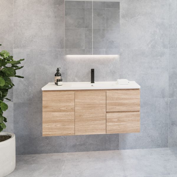 Timberline Florida wall hung vanity with white ceramic top and light woodgrain finish, shown floating in a modern bathroom
