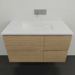 Timberline Nevada wall hung vanity with white Regal acrylic top, Tasmanian Oak finish and integrated basin, front view