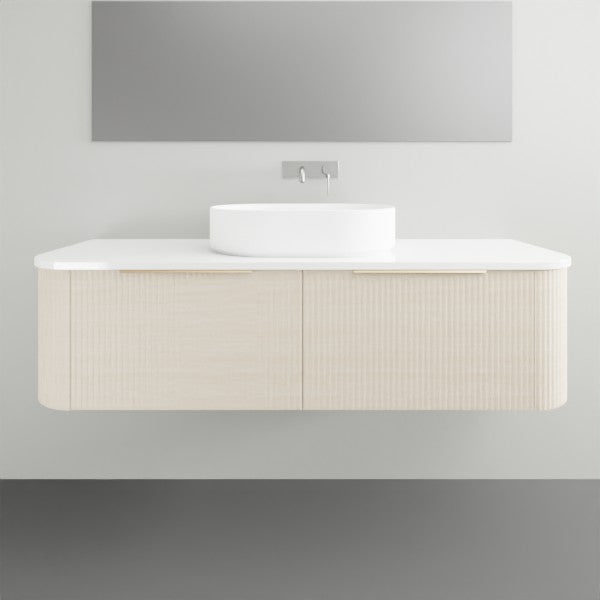 Timberline Santos Dockland wall hung vanity with fluted curved fronts, white top and above counter basin in a bathroom setting