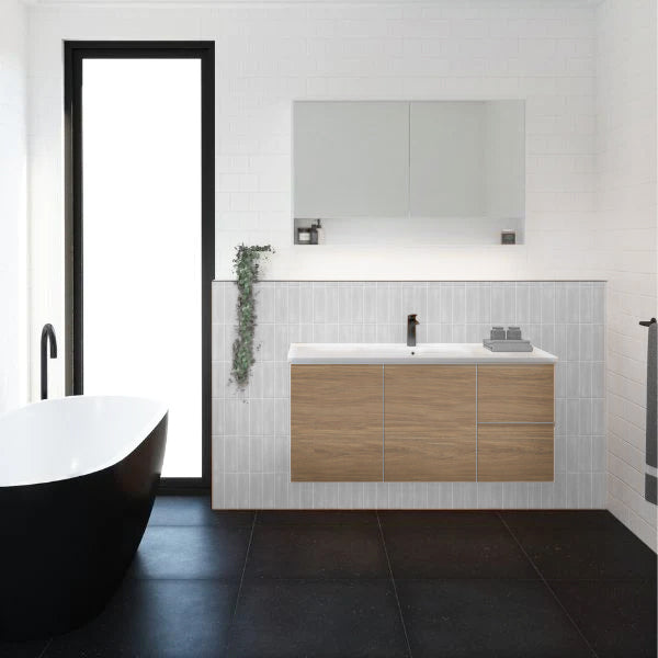 Timberline Swift wall hung vanity with white ceramic top and woodgrain cabinet in a bathroom setting