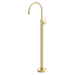 Phoenix Vivid Slimline oval floor-mounted bath mixer in brushed gold, freestanding tap with slim lever on a round base