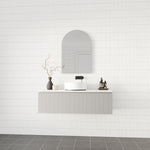 Marquis Valencia wall hung vanity in grey with fluted front, white benchtop and round basin in a tiled bathroom setting