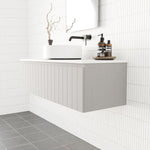 Marquis Valencia wall-hung vanity in matte grey, with shiplap detailing, white basin and benchtop in a bathroom setting