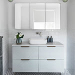 Caroma Luna above counter basin in gloss white ceramic, rectangular rounded profile, shown on a bathroom vanity with wall-mounted mixer