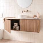 ADP Clifton wall-hung ensuite vanity with woodgrain finish, white top and round basin in a tiled bathroom