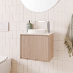 ADP Clifton mini wall-hung vanity in coastal oak woodmatt with white basin and benchtop in a tiled bathroom