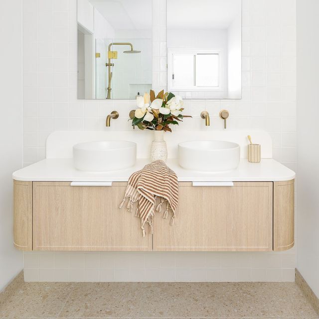 ADP Flo wall hung vanity with white top, light woodgrain finish and twin basin bathroom styling