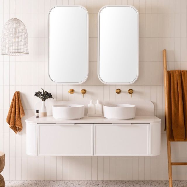 ADP 900mm centre bowl vanity in white, double round basins with rounded-edge mirrors in a bathroom setting