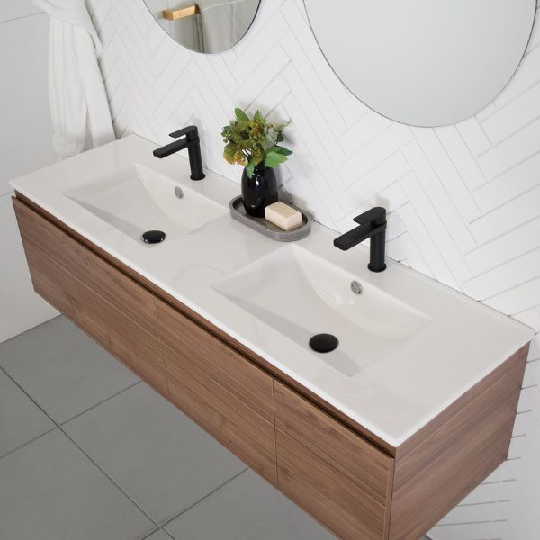 ADP Glacier Lite wall hung vanity with ceramic top, Nataio walnut finish, double basin and black tapware in bathroom setting