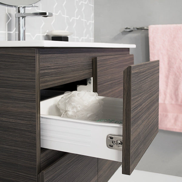 ADP Glacier Lite wall hung ensuite vanity in Bottega Oak woodmatt, with ceramic top and open drawer in bathroom setting