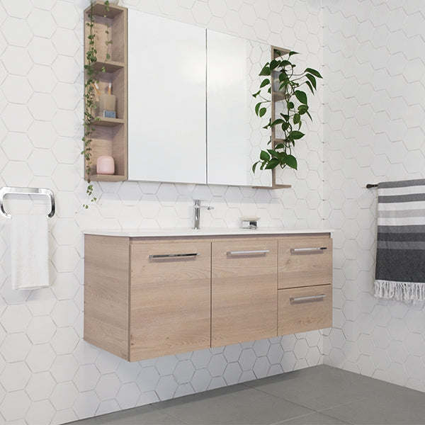 ADP Glacier Lite wall-hung vanity with ceramic top, woodgrain finish, white mirrored cabinet and chrome handles in bathroom setting