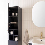 ADP Glacier Pro floor-mounted tallboy in Oxford Silk Matte with brushed brass handle, open shelves and black interior in bathroom scene