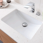 ADP Gravity white rectangular under counter basin in a speckled benchtop with chrome mixer tap and waste