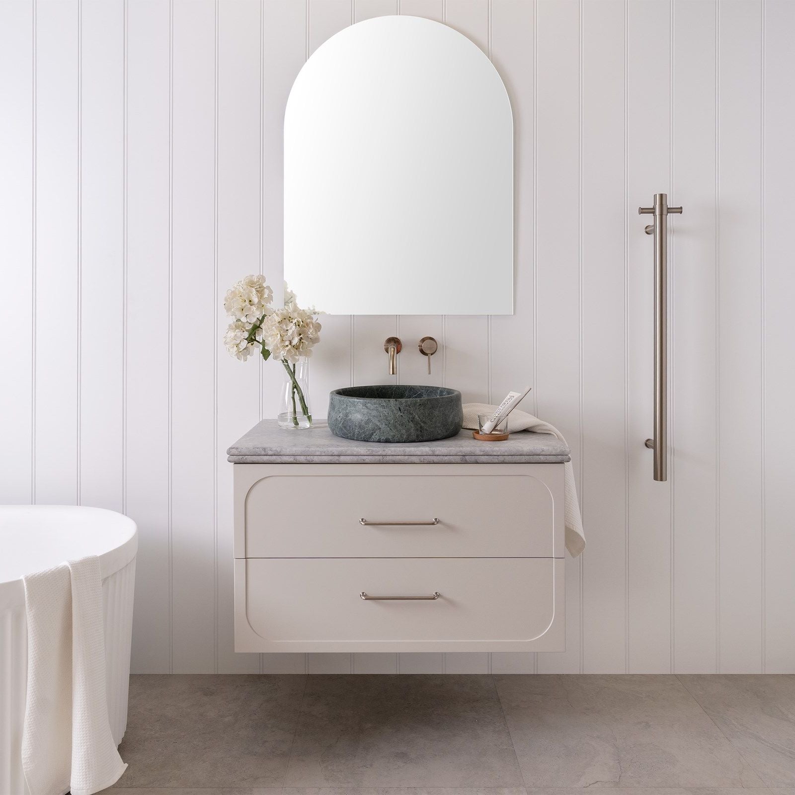 ADP Madden wall hung vanity in white with Caesarstone benchtop, twin drawers and round vessel basin in a modern bathroom