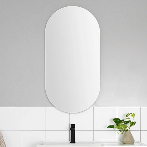 ADP Pill 450mm oval shaving cabinet, white mirror door, wall mounted above a bathroom basin